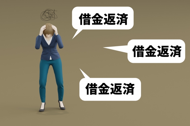 お金を手に頭を抱える。高槻市で債務整理の無料相談ができます